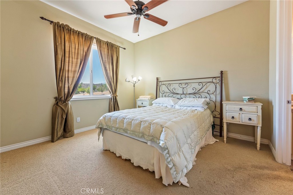 7940 Choi Drive Riverside, CA 92506 - Photo 45 of 56 a bed room with a bed and a window