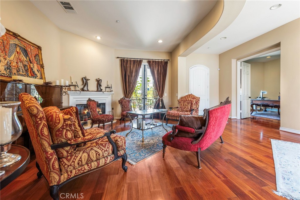 7940 Choi Drive Riverside, CA 92506 - Photo 9 of 56 a living room with furniture and a wooden floor