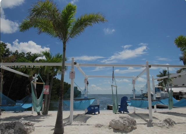 325 Calusa Street, Unit 118 Key Largo, FL 33037 - Photo 15 of 18 a view of a porch