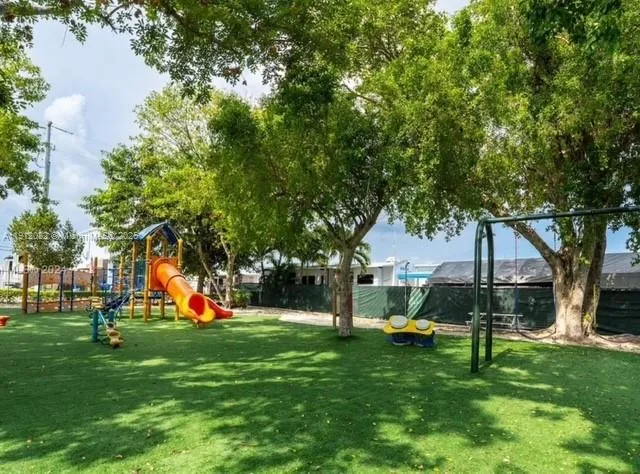 a view of outdoor space with seating area