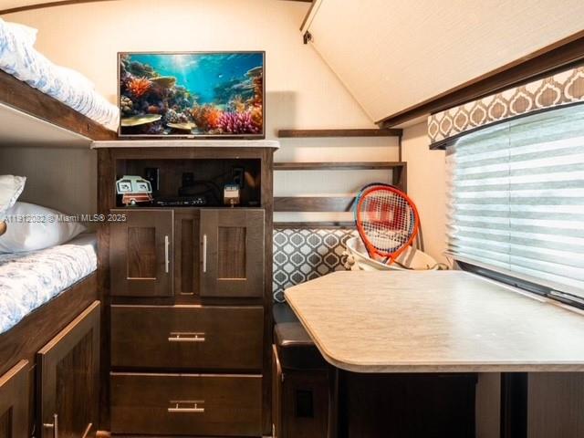 325 Calusa Street, Unit 118 Key Largo, FL 33037 - Photo 8 of 18 a view of a two chairs in the kitchen