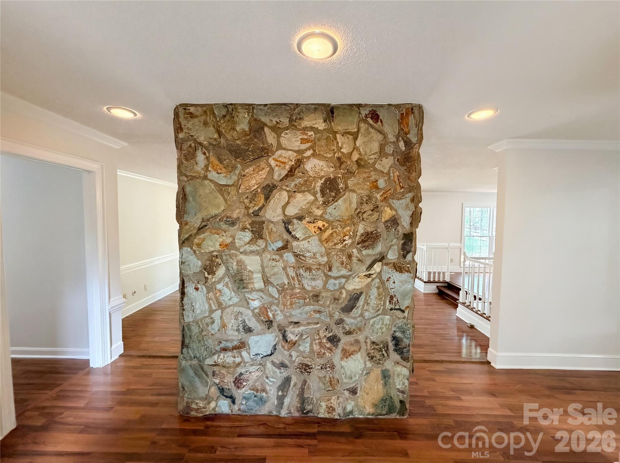 6024 Dovefield Road Charlotte, NC 28277 - Photo 6 of 17 a view of a bathroom with wooden floor and a sink