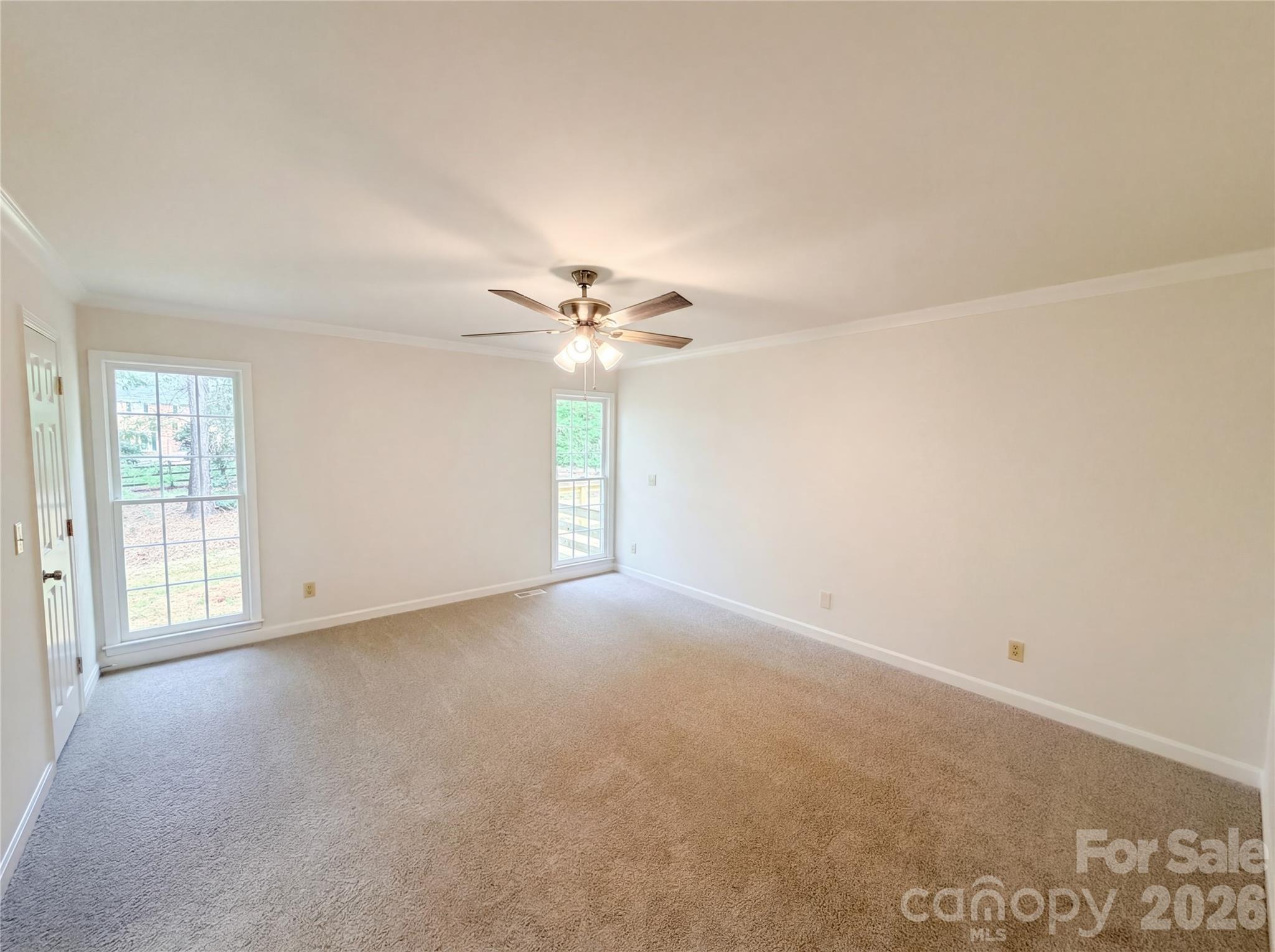 6024 Dovefield Road Charlotte, NC 28277 - Photo 10 of 17 a view of an empty room with a window