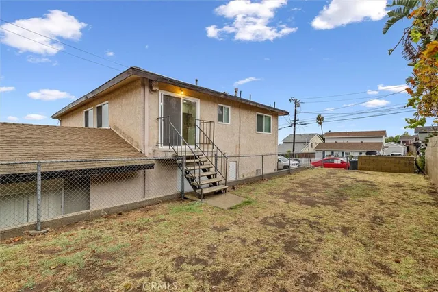 a view of balcony with wooden fence and floor