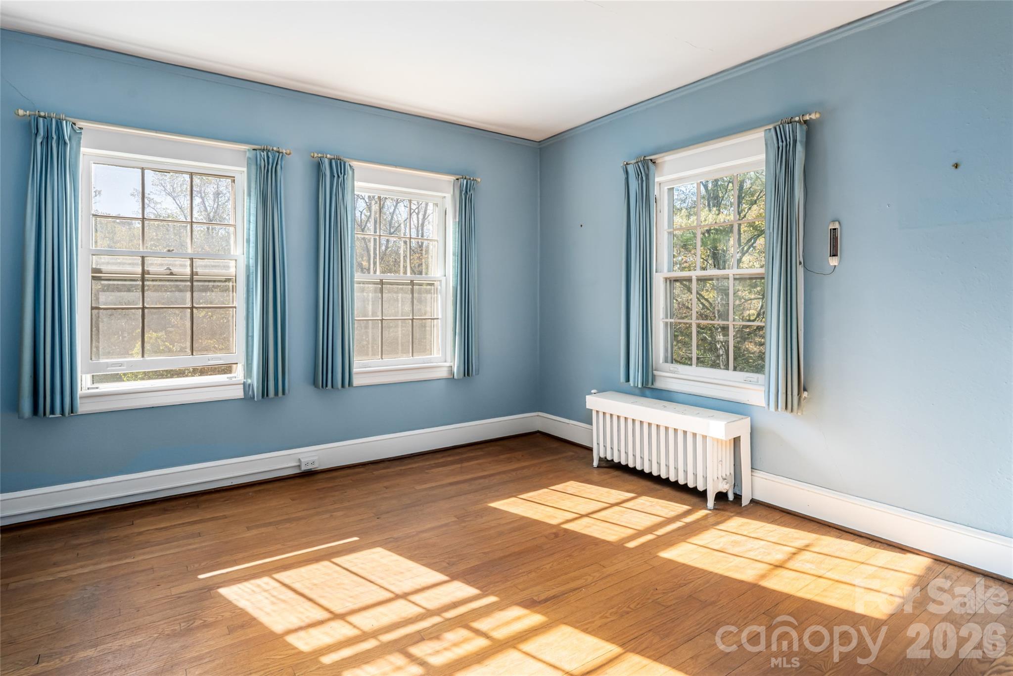325 Vanderbilt Road Asheville, NC 28803 - Photo 33 of 48 a view of an empty room with a window