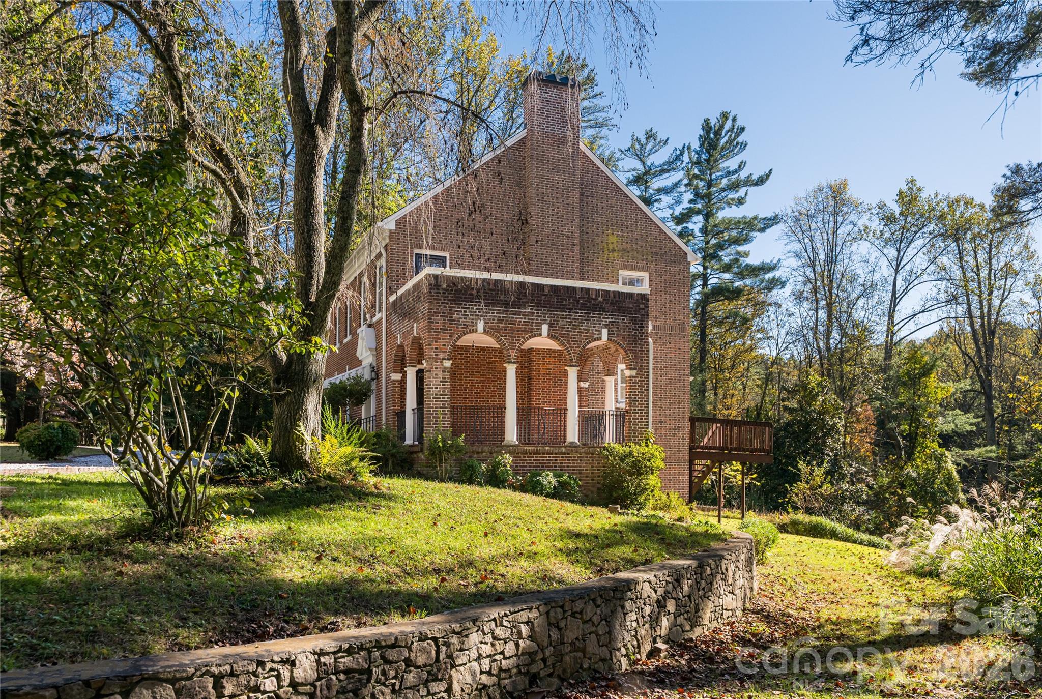 325 Vanderbilt Road Asheville, NC 28803 - Photo 42 of 48 a front view of house with yard and green space
