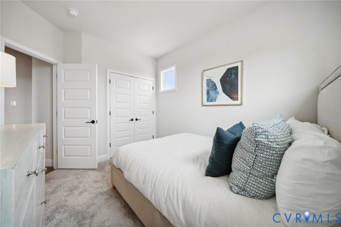 16116 Esteem Way Midlothian, VA 23113 - Photo 24 of 42 a bedroom with a bed and a painting on the wall