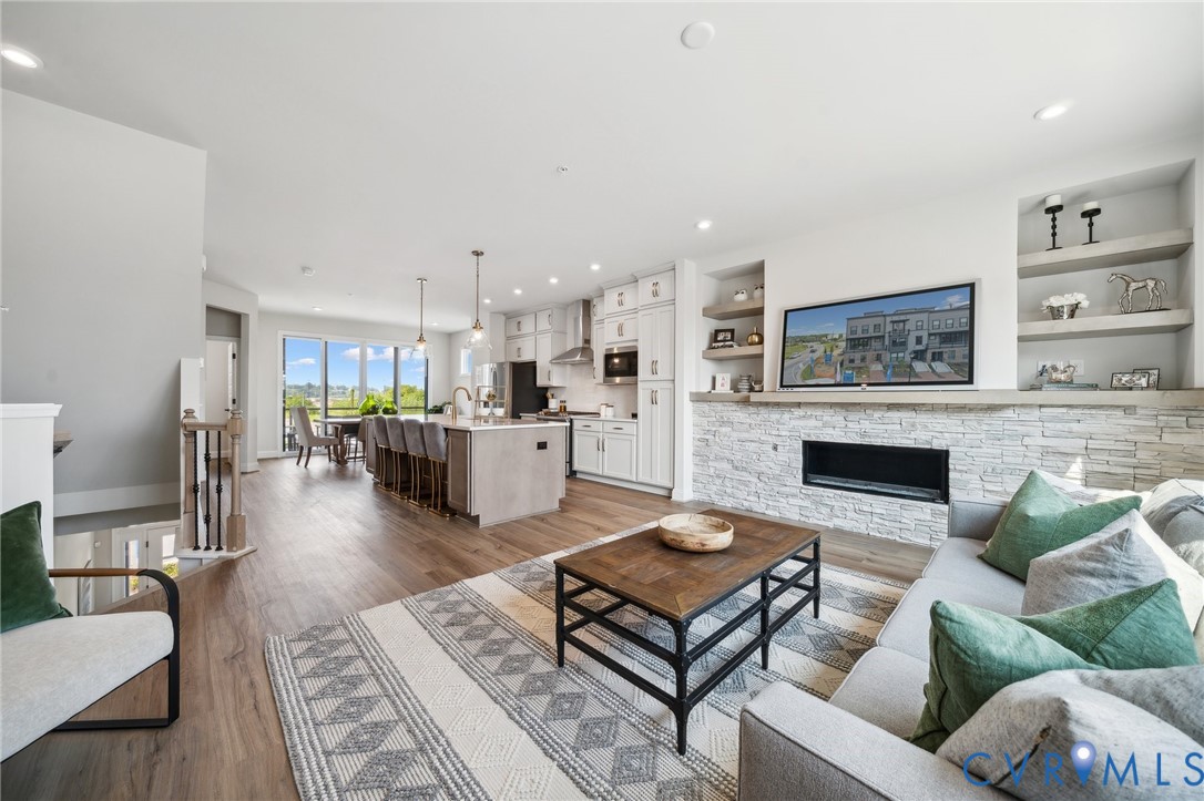 16116 Esteem Way Midlothian, VA 23113 - Photo 8 of 42 a living room with furniture and a fireplace