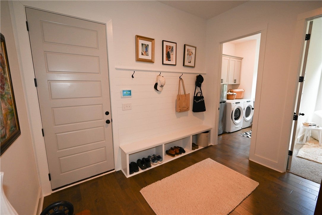 2865 Pear Tree Road Auburn, AL 36879 - Photo 19 of 49 Mudroom with laundry in far right background, bedroom to right. Door to garage.