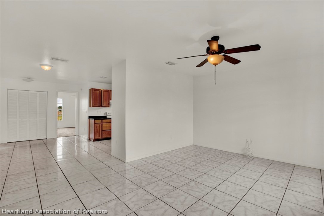 3533 Cemetery Road Sebring, FL 33870 - Photo 6 of 21 wooden floor in an empty room