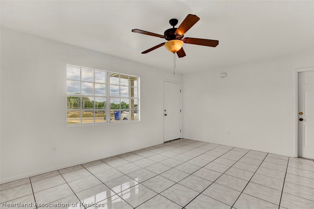 3533 Cemetery Road Sebring, FL 33870 - Photo 9 of 21 a view of an empty room and window