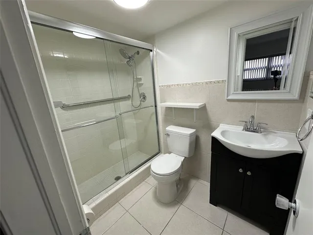 a view of a street with cars