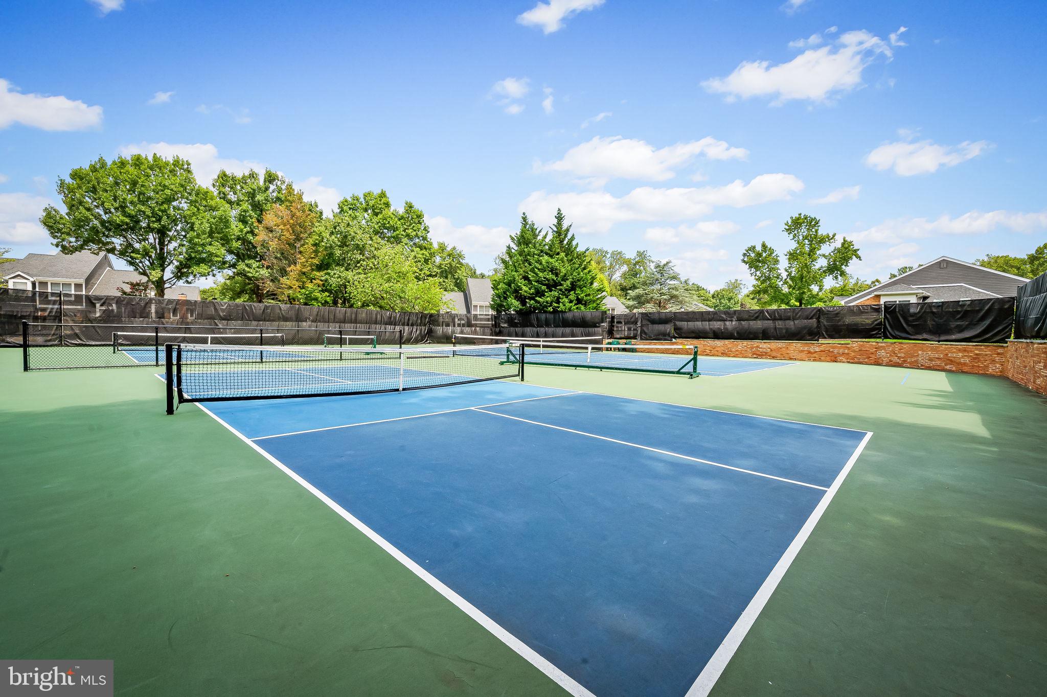 102 River Oaks Circle Baltimore, MD 21208 - Photo 6 of 7 a view of a tennis court