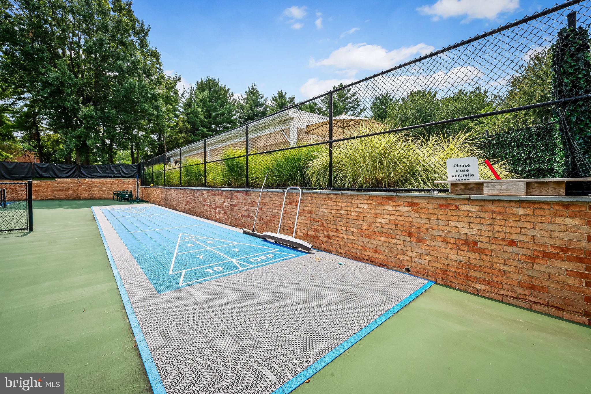 102 River Oaks Circle Baltimore, MD 21208 - Photo 7 of 7 a view of a backyard