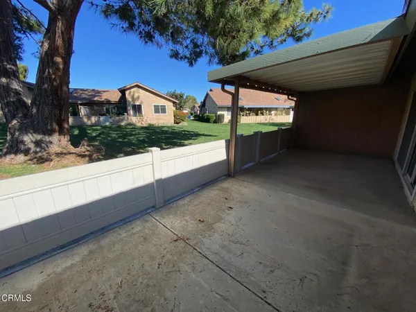 a view of a house with a large window