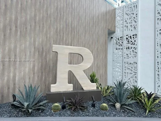 a close view of a potted plant in a corridor
