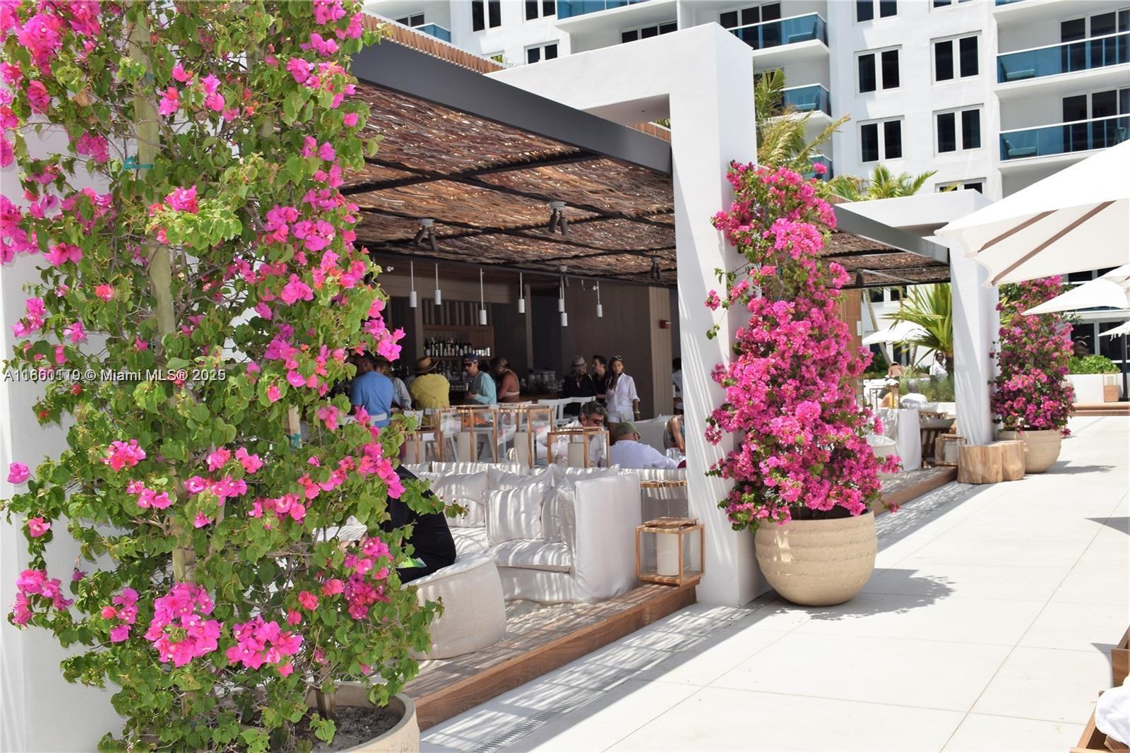 2301 Collins Avenue, Unit 306 Miami Beach, FL 33139 - Photo 9 of 27 a building view with lot of flowers and flowers