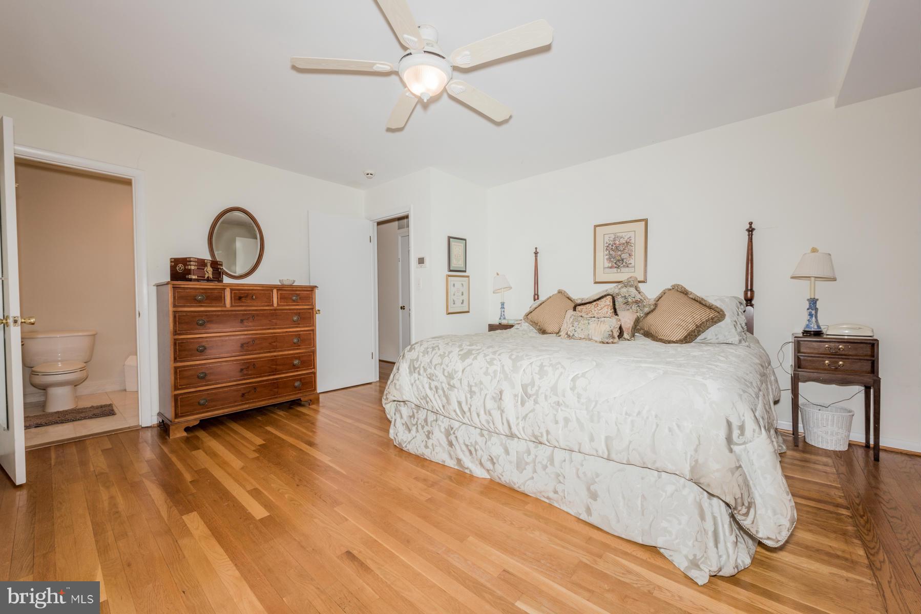13602 Royal Crest Road Phoenix, MD 21131 - Photo 20 of 29 a bedroom with a bed and a dresser