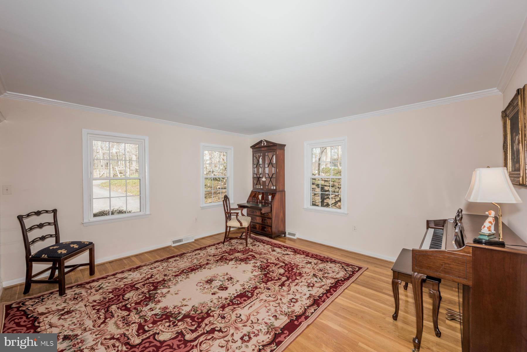 13602 Royal Crest Road Phoenix, MD 21131 - Photo 3 of 29 a bedroom with furniture and a window