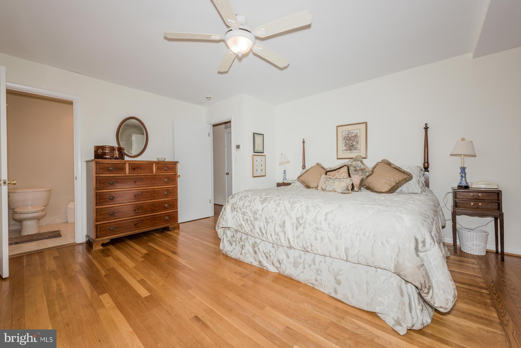 13602 Royal Crest Road Phoenix, MD 21131 - Photo 21 of 29 a bedroom with a bed and a dresser