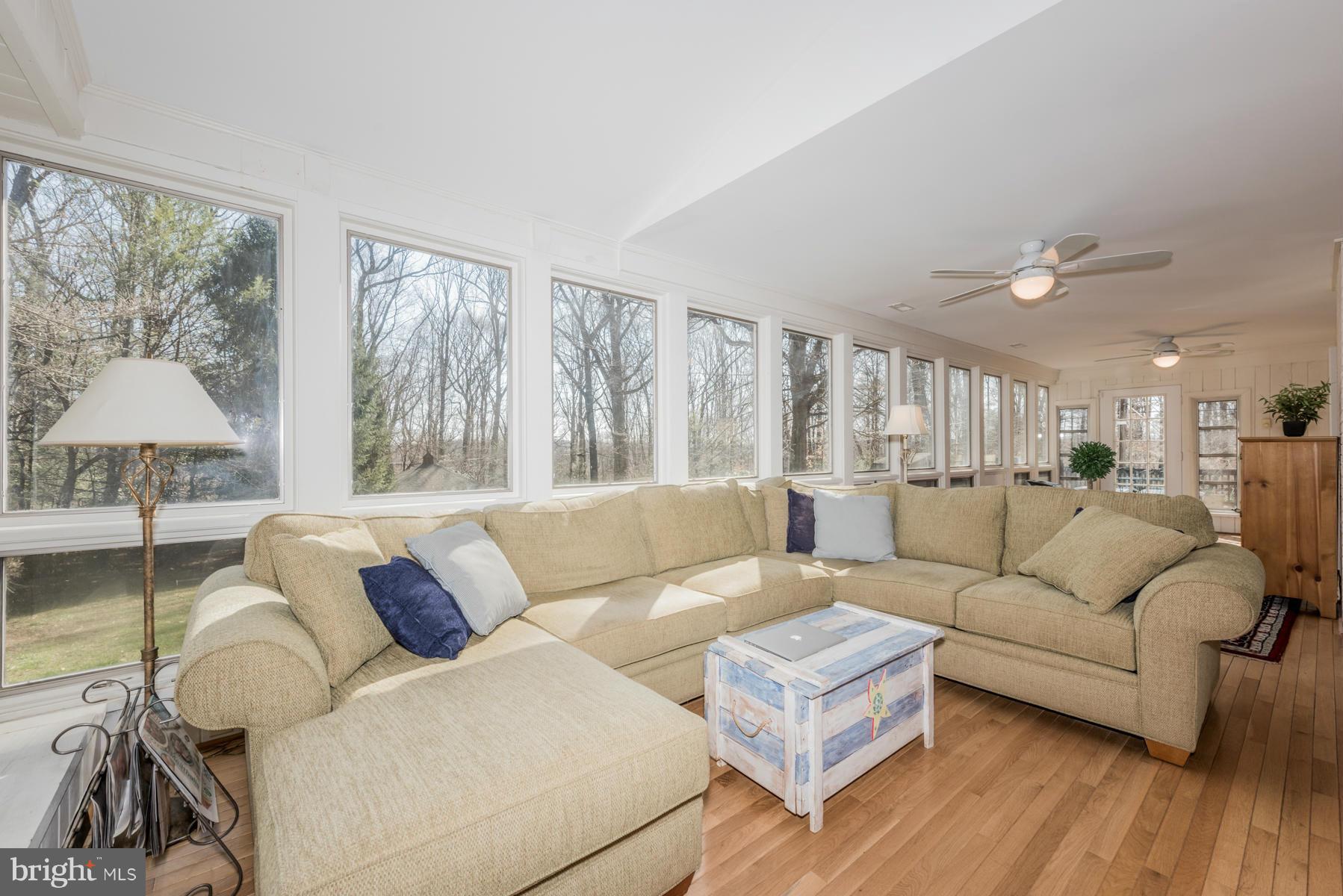 13602 Royal Crest Road Phoenix, MD 21131 - Photo 23 of 29 a living room with furniture and a large window