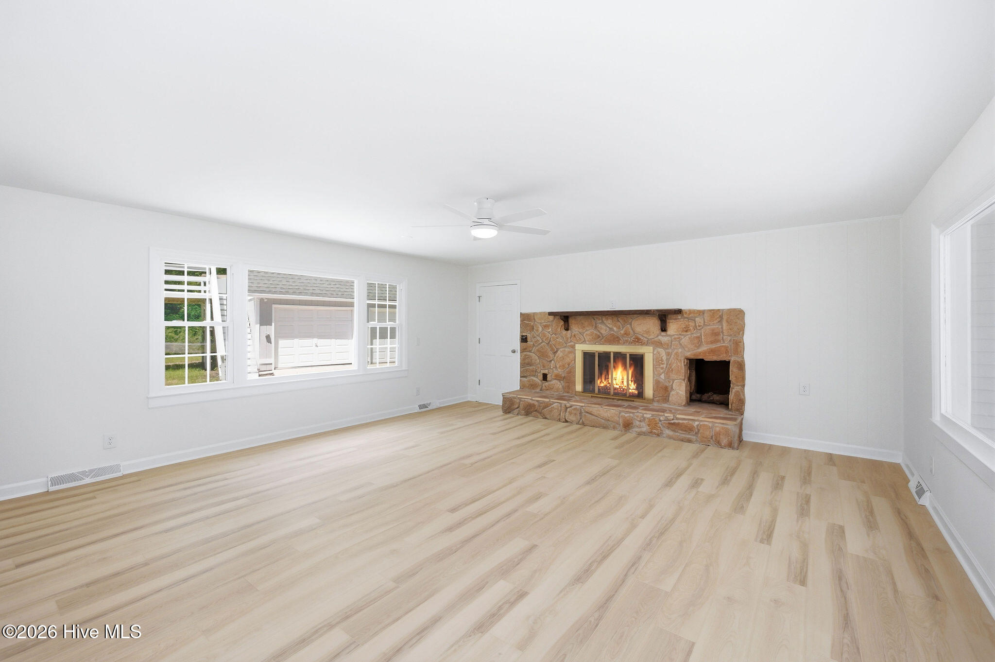 114 Country Place Road Wilmington, NC 28409 - Photo 5 of 63 Living Room (fire is AI generated)