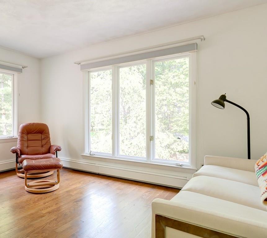 33 Laxfield Road Weston, MA 02493 - Photo 16 of 21 a living room with furniture and a window