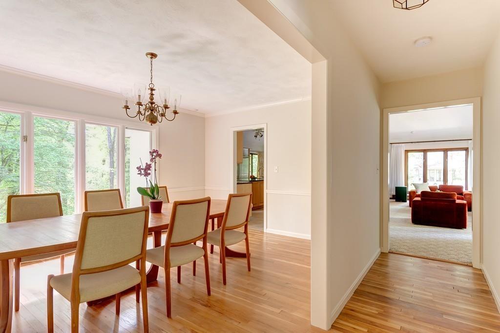 33 Laxfield Road Weston, MA 02493 - Photo 8 of 21 a view of a dining room with furniture window and wooden floor