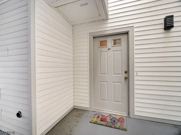 a view of an entryway door front of house
