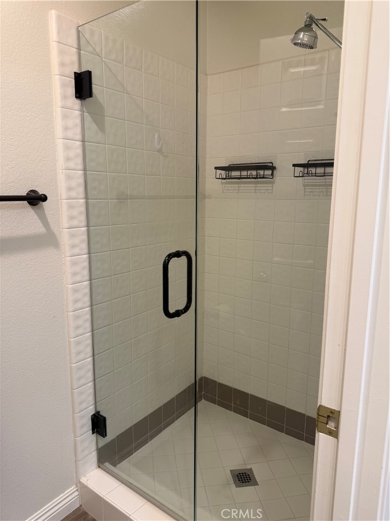 33706 Surfside Drive, Unit 146 Dana Point, CA 92629 - Photo 11 of 17 a bathroom with a shower