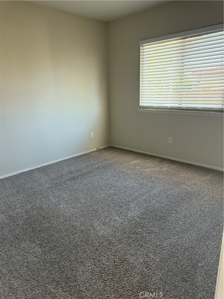 33706 Surfside Drive, Unit 146 Dana Point, CA 92629 - Photo 12 of 17 an empty room with a window