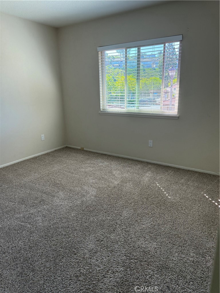33706 Surfside Drive, Unit 146 Dana Point, CA 92629 - Photo 14 of 17 an empty room with a window