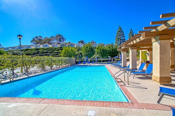 33706 Surfside Drive, Unit 146 Dana Point, CA 92629 - Photo 16 of 17 a view of swimming pool with outdoor seating