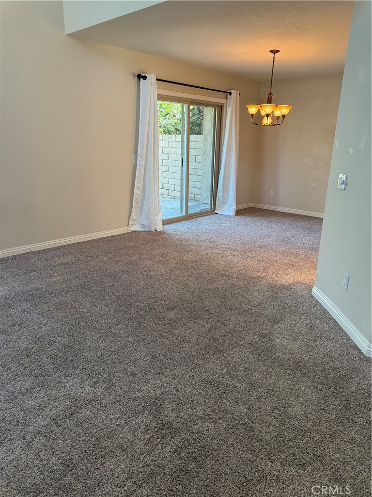 33706 Surfside Drive, Unit 146 Dana Point, CA 92629 - Photo 7 of 17 a view of empty room with window