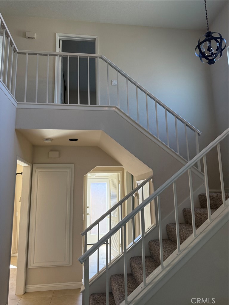 33706 Surfside Drive, Unit 146 Dana Point, CA 92629 - Photo 17 of 17 a view of staircase with white walls and a window