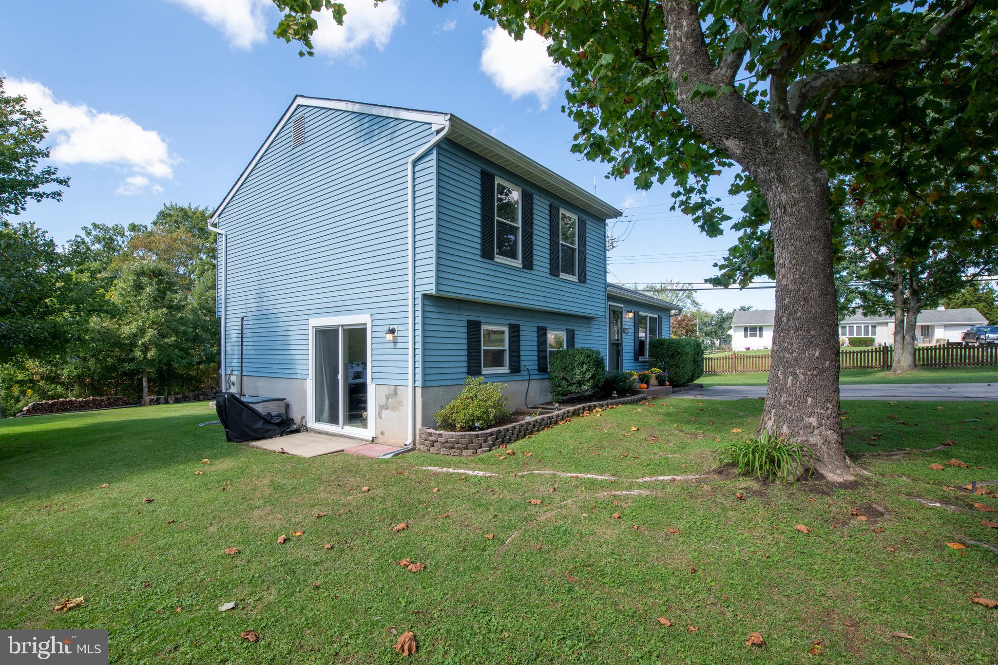 5014 Tartan Hill Road Perry Hall, MD 21128 - Photo 3 of 43 a view of a yard in front of house