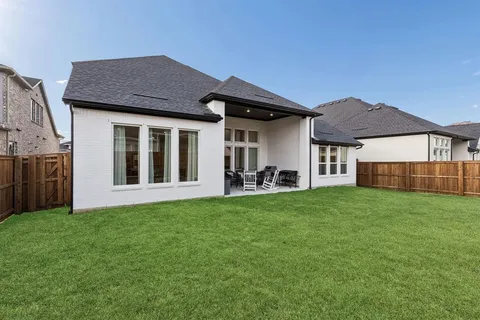 a house view with a garden space