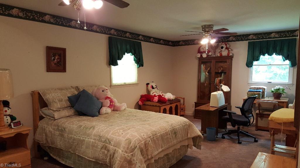 1477 Tillotson Road Pinnacle, NC 27043 - Photo 11 of 17 Large second bedroom