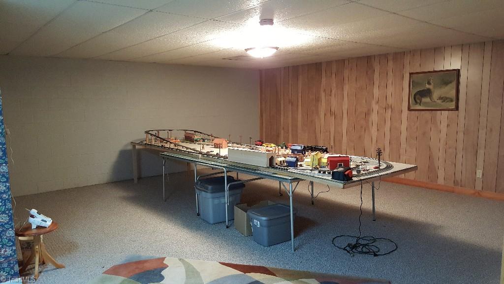 1477 Tillotson Road Pinnacle, NC 27043 - Photo 17 of 17 Large playroom also in basement