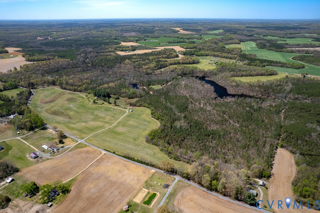 18262 Seals Road Bowling Green, VA 22427 - Photo 41 of 50 an aerial view of residential houses with outdoor space