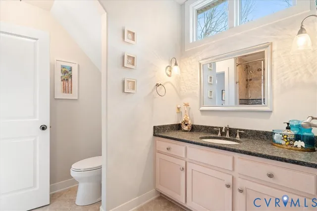 a bedroom with a bed and dresser