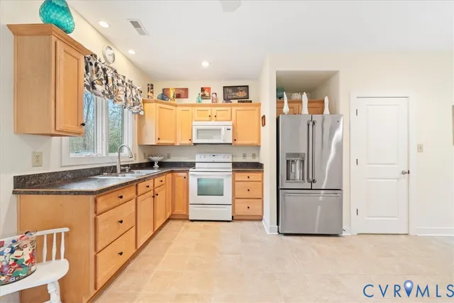 a bedroom with a bed and a table in it