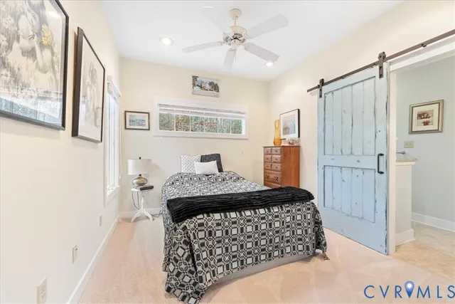 a bathroom with a toilet sink and shower
