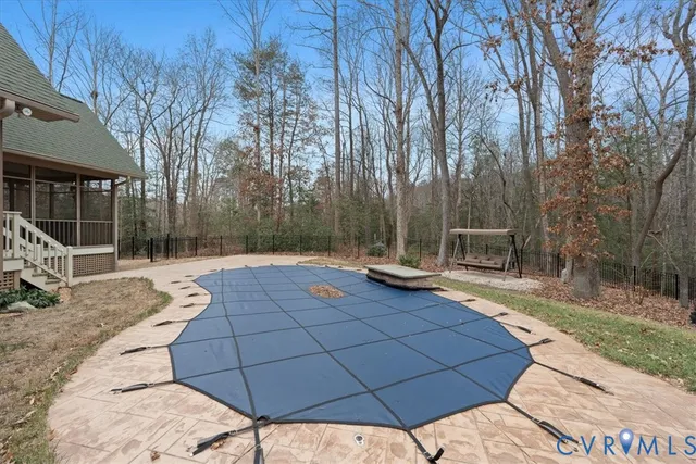 a view of balcony with wooden floor and outdoor seating