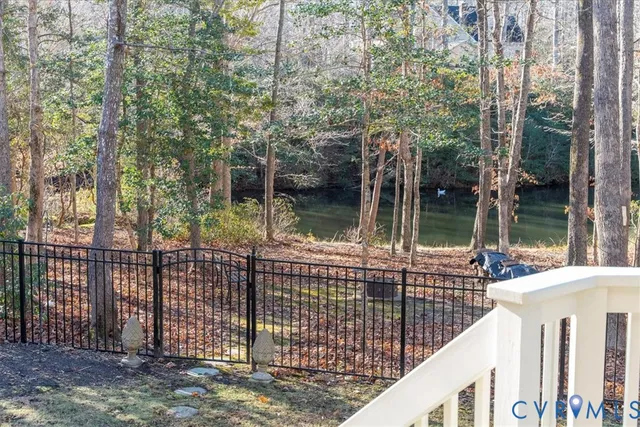 a view of a backyard with trees