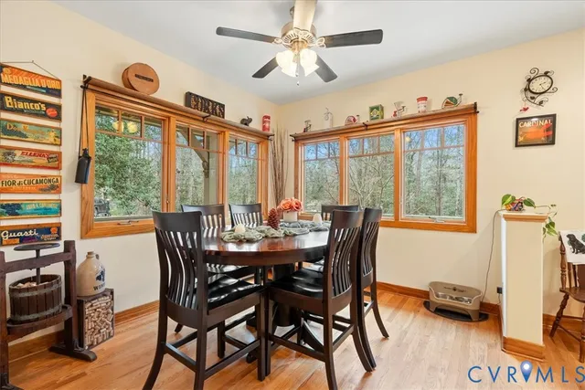a kitchen with stainless steel appliances kitchen island granite countertop a sink and cabinets