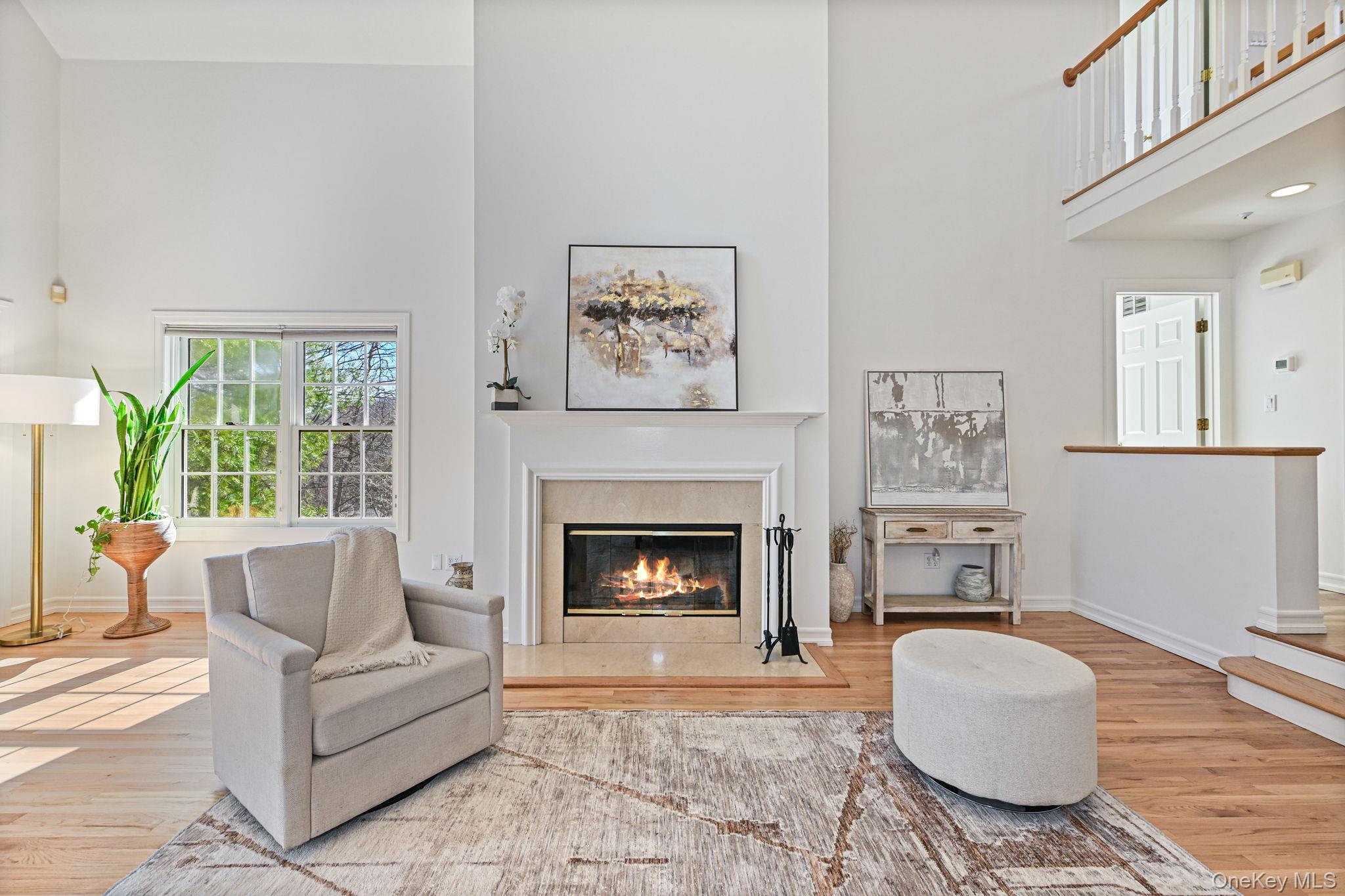 125 Cross River Road Mount Kisco, NY 10549 - Photo 11 of 46 Gas fireplace with marble surround