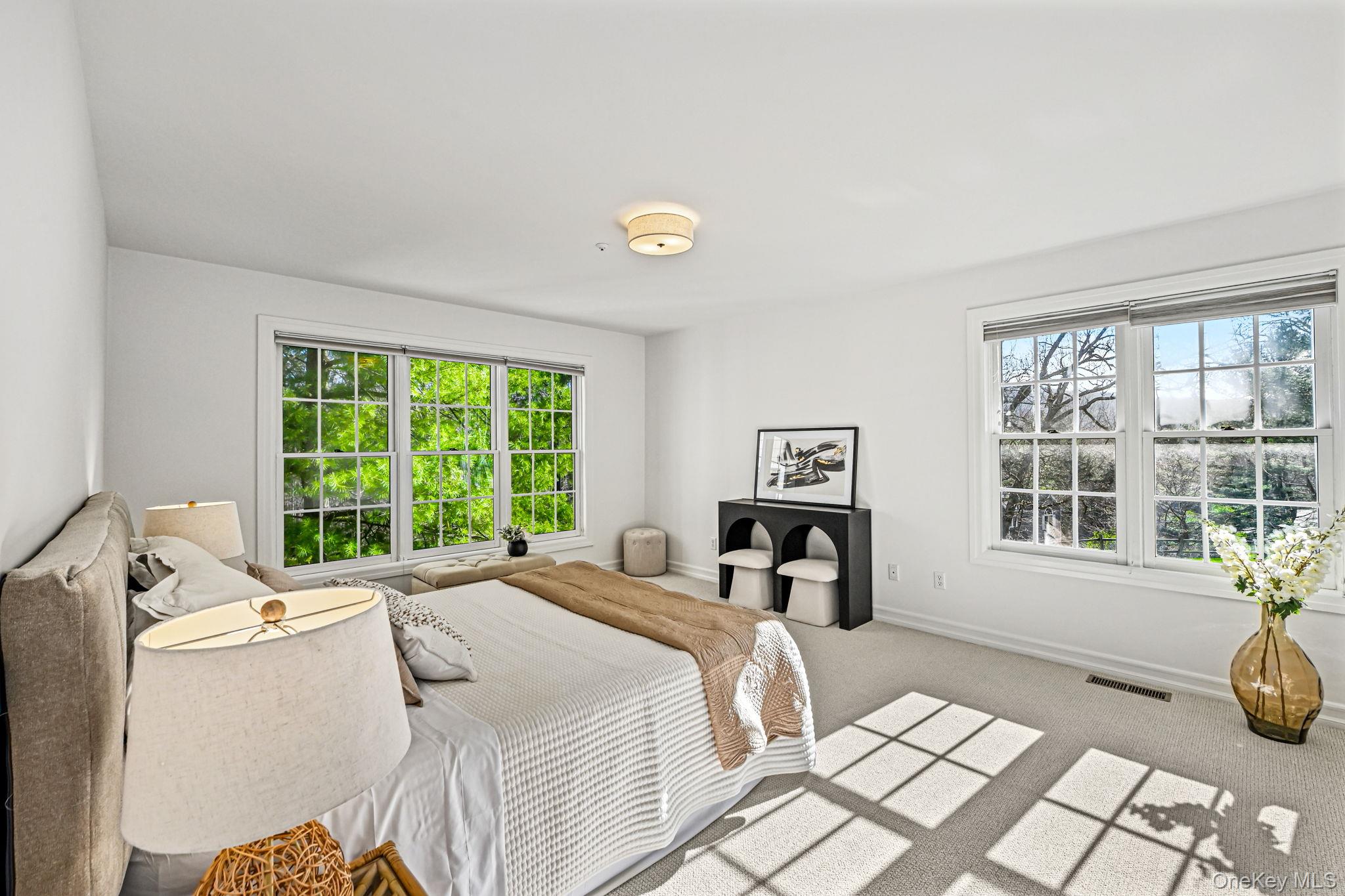 125 Cross River Road Mount Kisco, NY 10549 - Photo 21 of 46 Large Primary Bedroom on ground floor with dual aspect windows