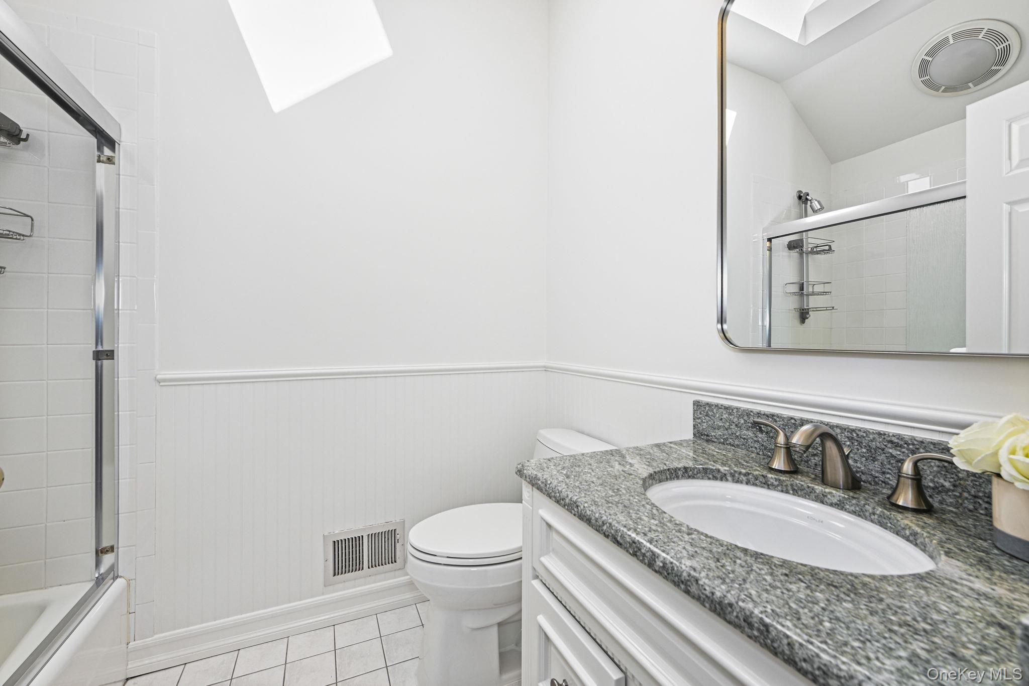125 Cross River Road Mount Kisco, NY 10549 - Photo 30 of 46 2nd floor Bathroom with bath/shower and bright skylight window