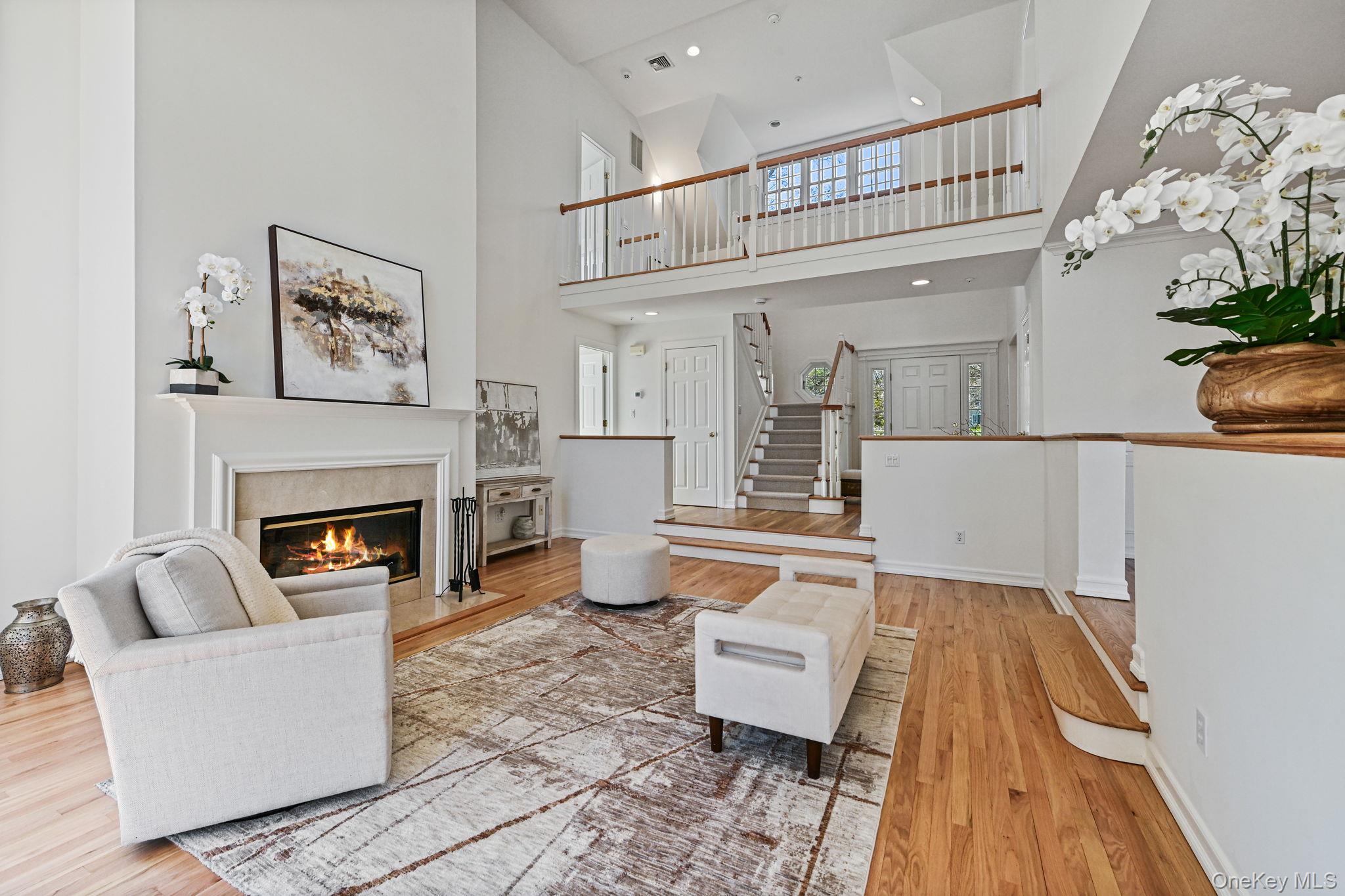 125 Cross River Road Mount Kisco, NY 10549 - Photo 8 of 46 Dramatic Living room with gas fireplace and cathedral ceilings